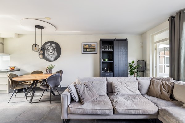 Foto - Te koop:  Verzorgde tussenwoning in Fijnaart!